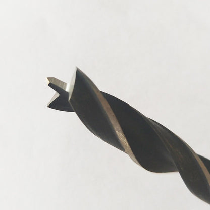7mm brad point drill bit tip close-up