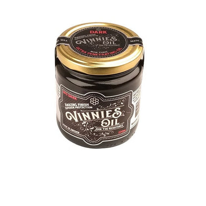 Jar of Vinnie's Oil Dark on a white background