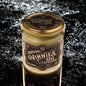 Jar of Vinnies Oil Hard Wax on a dark textured water splash background